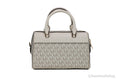 Michael Kors Travel XS Light Cream Signature PVC Duffle Crossbody Handbag